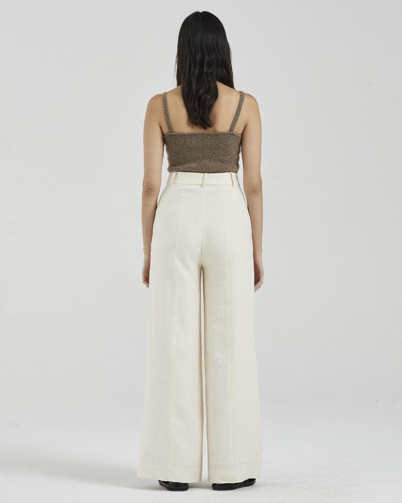 The design is fitted at the waist with a wide fit over the legs. Crafted from a luxurious heavyweight linen and fully lined, these pants will become a year-round staple. Wear with everything. By Friends with Frank, now available at After Eight. 