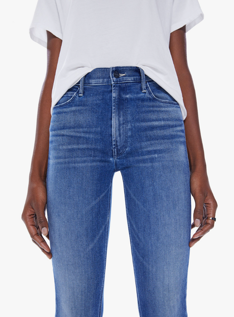 The most popular mid-rise straight leg hits at the ankle with a clean hem. Cut from stretch denim, Wish On A Star is a mid-blue wash with whiskering and fading at the knees. By Mother Denim, now available at After Eight. 