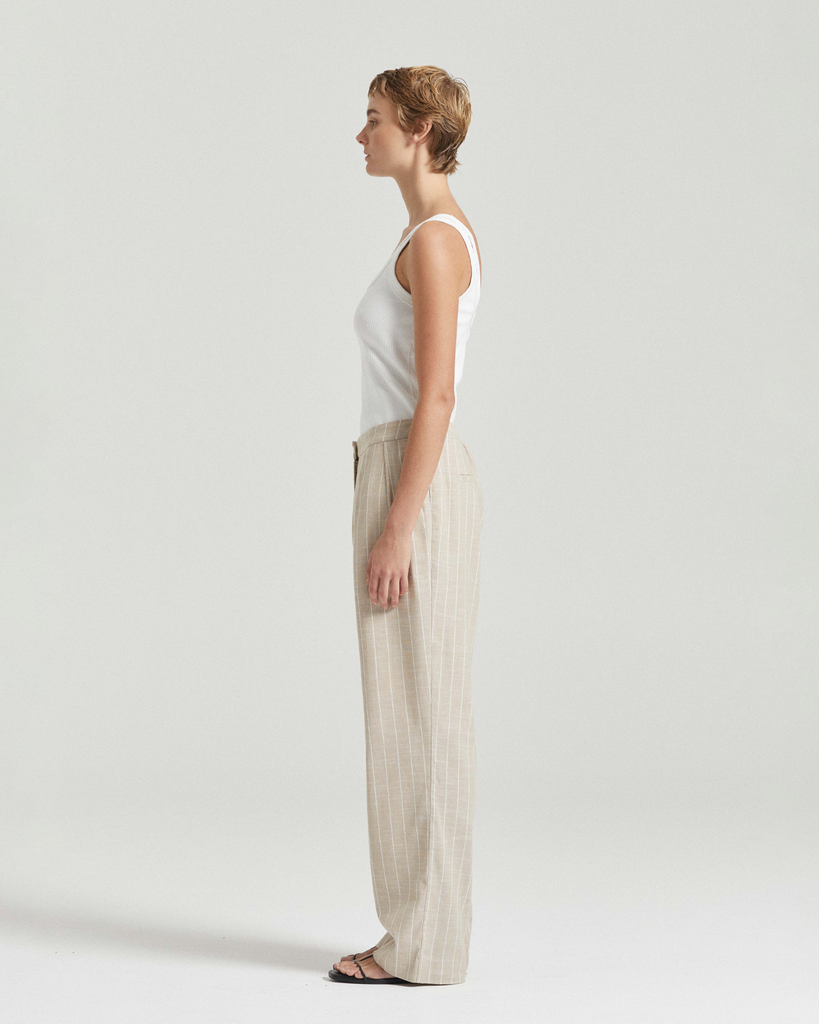 Responsibly crafted in Melbourne, the Gabriel Trousers deliver pared-back sophistication for day or evening. The trousers feature an elastic back waistband and mid-rise fit, creating a relaxed slouchy leg silhouette. Opt for the full look with the coordinating Gabriel Vest, or style as a seperate with a quality basic. By Friends with Frank, now available at After Eight. 