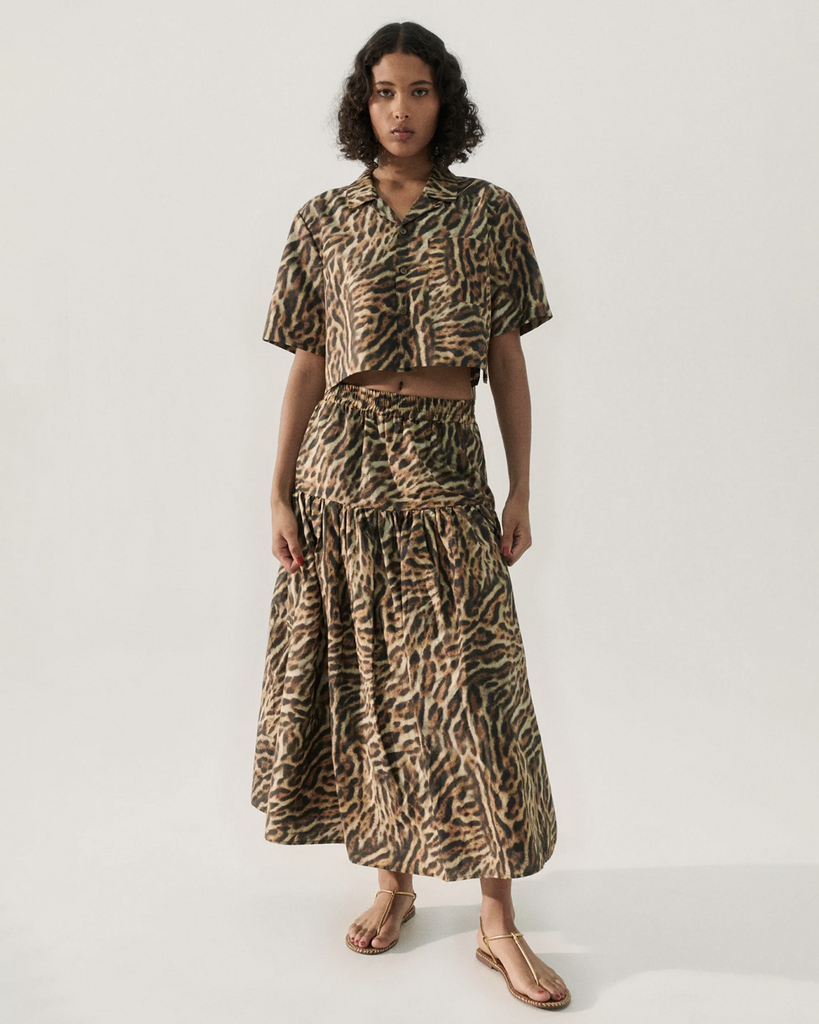 The Silk Laundry Cotton Silk 80s Skirt, blends cotton and silk for a smooth feel. An elastic waist and side slit define its relaxed, above-the-ankle fit. By Silk Laundry, now available at After Eight. 