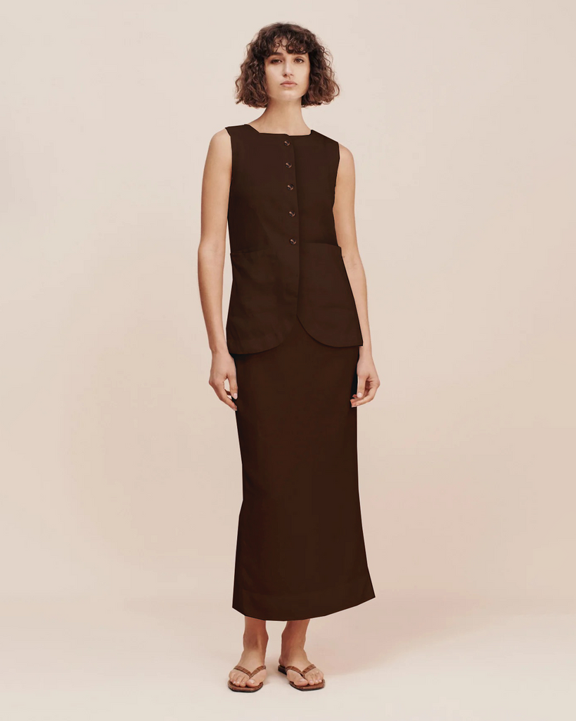 The Emma Pencil Skirt is designed for a close fit and sits high on the waist. It falls to an elegant maxi hem and has a split at the back for movement. Wear yours as a set with the Emma Vest. By Posse, now available at After Eight. 