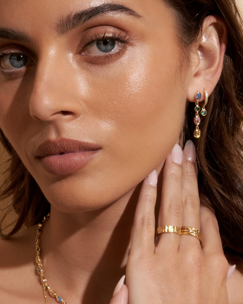 Sparkle and shine with the gorgeous and grand Isadora Earrings. With they beautiful gold and stone drop, this luxe pair of earrings will instantly turn your look into regal glamour! By Arms of Eve, now available at After Eight. 