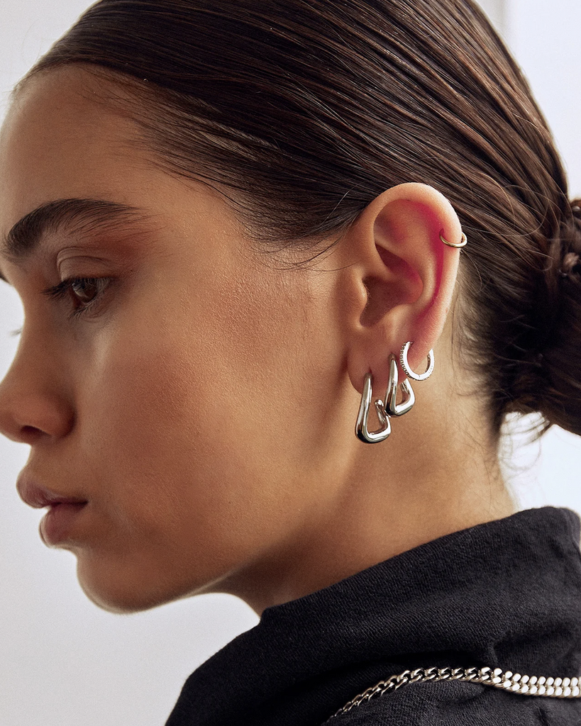 Jewels with the perfect edge, the Mikayla Earrings will take your accessory game to the next level. Unique in shape they are the piece to take you from day to night. By Arms of Eve, now available at After Eight. 