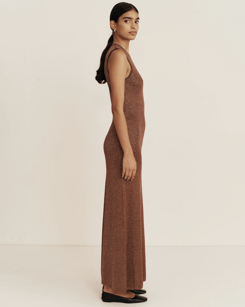 Classic knit midi dress shape in mixed metallic yarn for a subtle golden fleck by Esse. Now Available at After Eight. 
