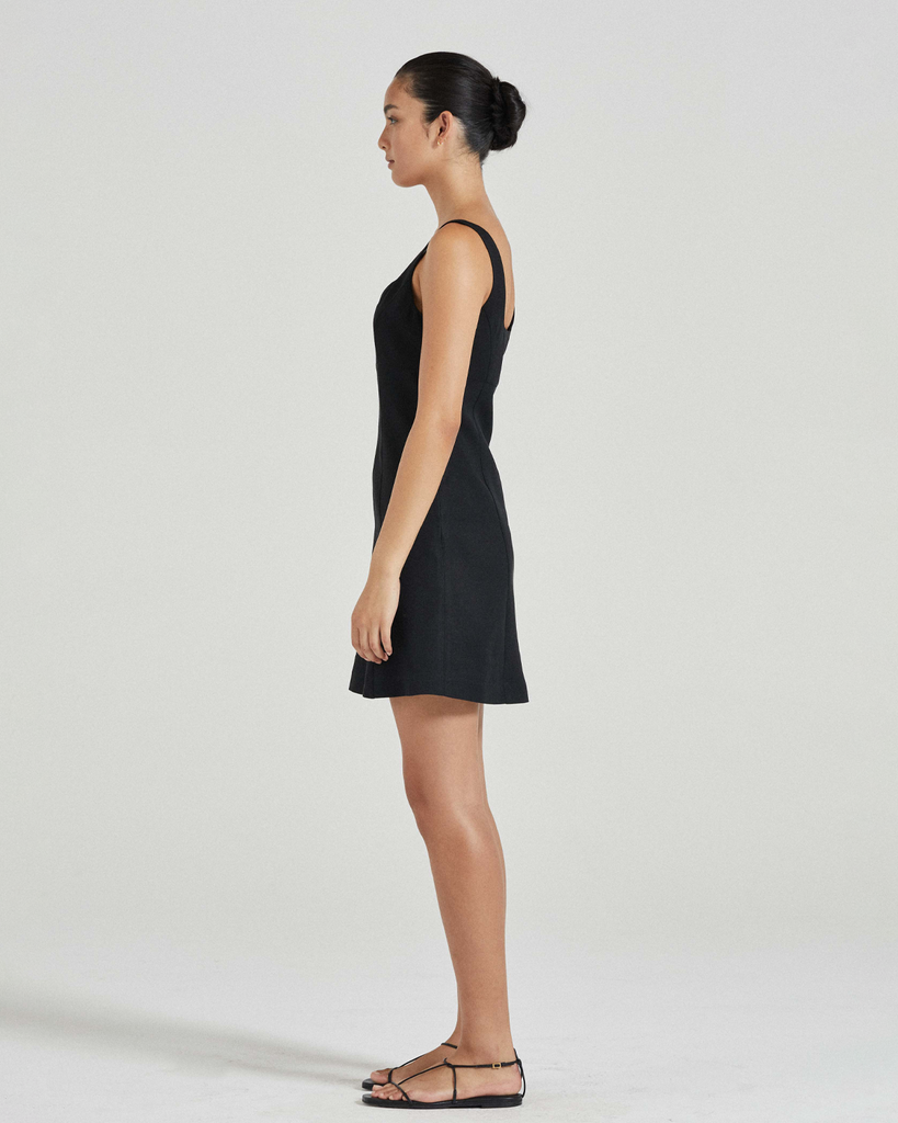 Short, sharp and chic, the Xanthe Mini Dress is SS23's take on the LBD. Featuring a feminine cut out, a slight A-line skirt silhouette and panel line shaping, this dress is a summer staple. By Friends with Frank, now available at After Eight. 