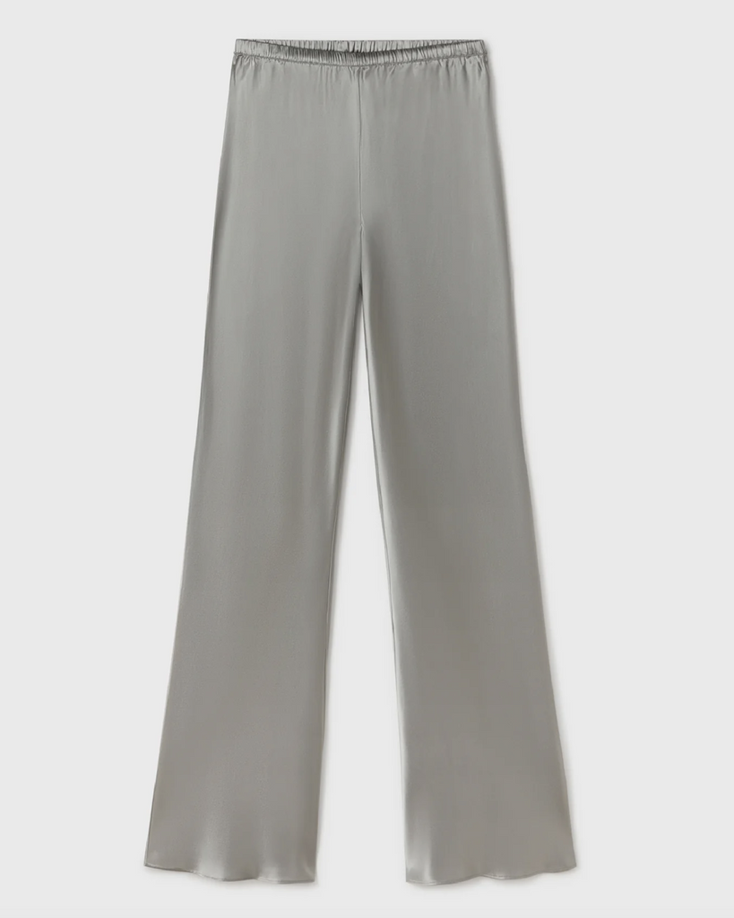 Silk Laundry pants crafted in 100% silk with a glossy finish. Cut on the bias to a regular fit, with an elasticated waistband that sits above the hip. By Silk Laundry, now available at After Eight. 