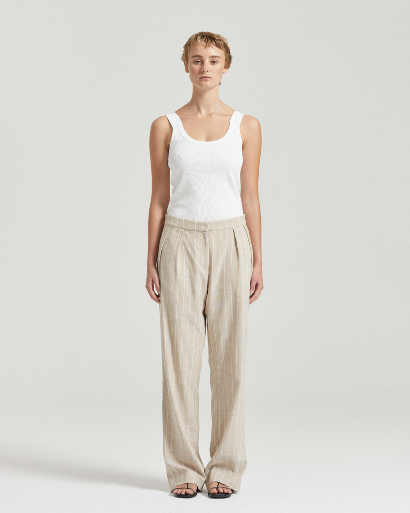 Responsibly crafted in Melbourne, the Gabriel Trousers deliver pared-back sophistication for day or evening. The trousers feature an elastic back waistband and mid-rise fit, creating a relaxed slouchy leg silhouette. Opt for the full look with the coordinating Gabriel Vest, or style as a seperate with a quality basic. By Friends with Frank, now available at After Eight. 