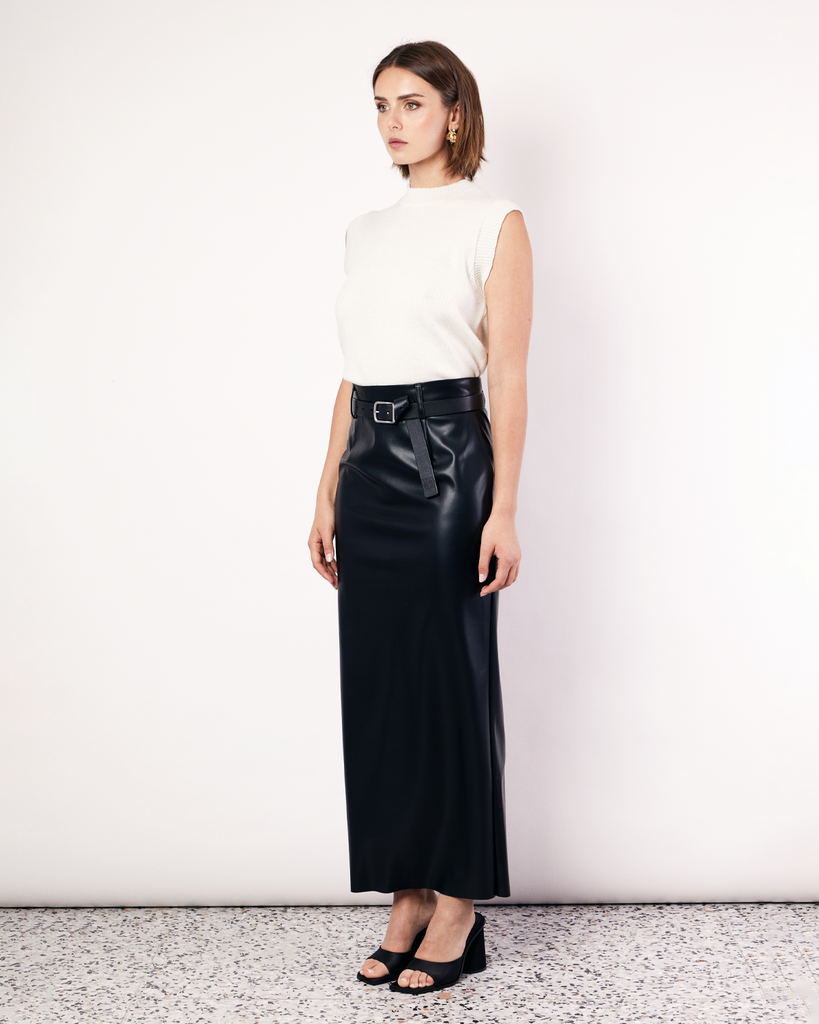 The best selling, Maxi Suiting Skirt has been recut for Fall in a buttery soft vegan leather. It features belt loops and a back split for ease of wear. By Romy, now available at After Eight.