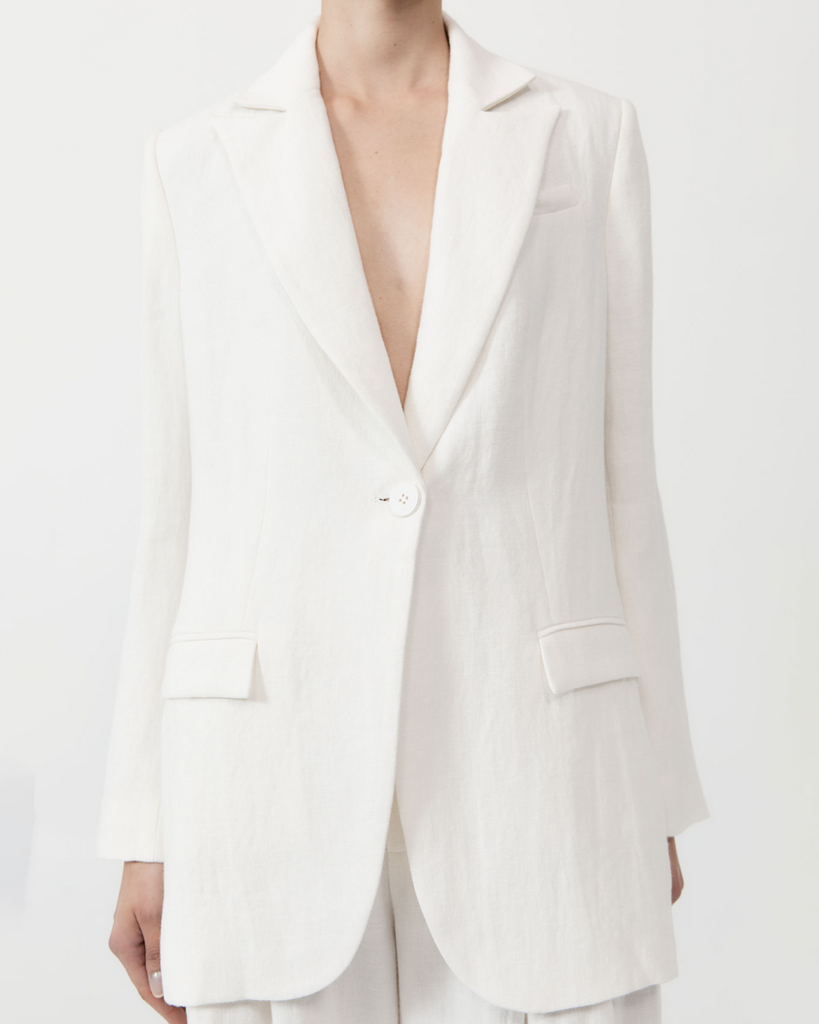 A St. Agni signature — reimagined. The Tailored Linen Blazer boasts a single button closure, single breast, welt pockets, tailored fit and 100% linen construction. Crafted with a silky-soft 100% lyocell lining, the Tailored Linen Blazer pairs perfectly with the Tailored Linen Pants for a soft yet confident match made in heaven. By St Agni, now available at After Eight. 