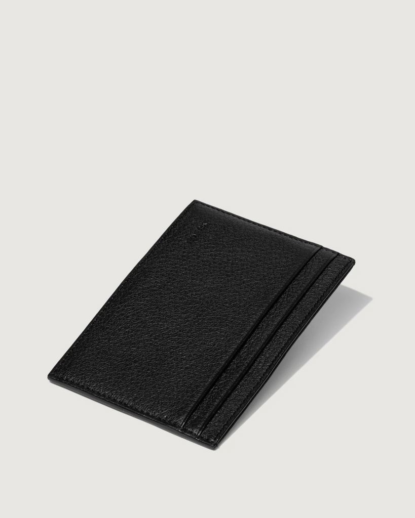 Youhan is a meticulously groomed city slicker. This large-format cardholder features four regular card slots and three larger compartments to discreetly house a passport and some metro cards. By Yu Mei, now available at After Eight. 