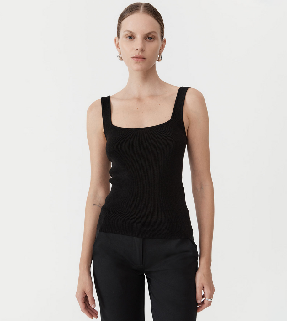 Designed for everyday wear, the Square Neck Knit Singlet is crafted from the St Agni signature 100% TENCEL™ construction making for a weighty knit that feels both polished and precise. Boasting a mirrored front and back square neck and textural ribbed body-feel, the Square Neck Knit Singlet is this season’s warm-weather must-have. By St Agni, now available at After Eight. 