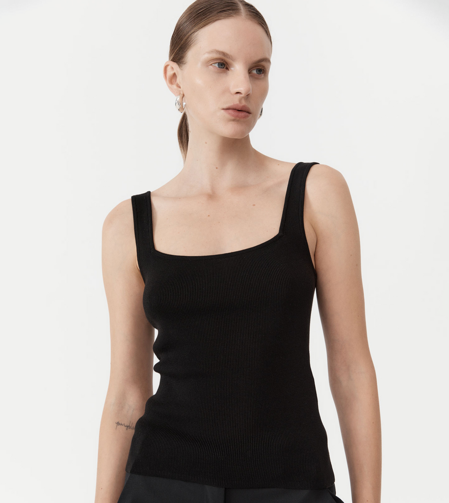 Designed for everyday wear, the Square Neck Knit Singlet is crafted from the St Agni signature 100% TENCEL™ construction making for a weighty knit that feels both polished and precise. Boasting a mirrored front and back square neck and textural ribbed body-feel, the Square Neck Knit Singlet is this season’s warm-weather must-have. By St Agni, now available at After Eight. 