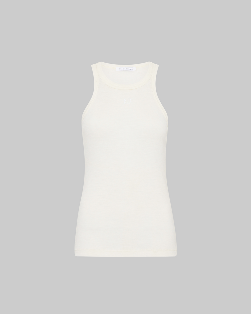 A new addition to FWF basics; introducing the FWF Tank. Made in Melbourne from Australian merino, the FWF Tank is a versatile layer to have on rotation. The semi sheer tank has a luxuriously soft hand feel, featuring a subtle embroidered FWF monogram at the centre front. Wear on its own with relaxed tailoring, or over the FWF Top for a layering moment. By Friends with Frank, now available at After Eight. 