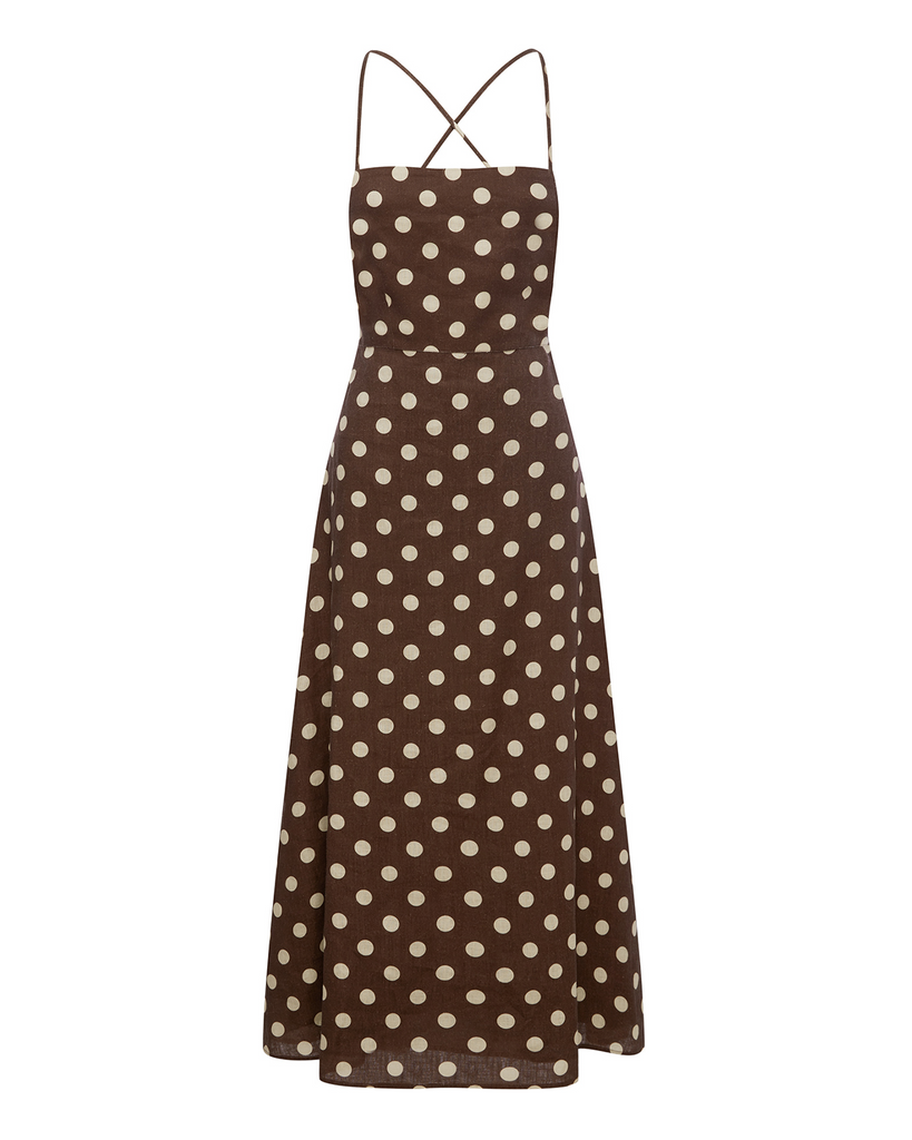 Patterned with classic polka-dots, The Lori Dress is a statement piece perfect for both day and evening wear. It features a flattering square neckline, elasticated back and free-flowing maxi skirt. It turns to reveal a stunning open back with an adjustable tie feature. By Posse, now available at After Eight. 