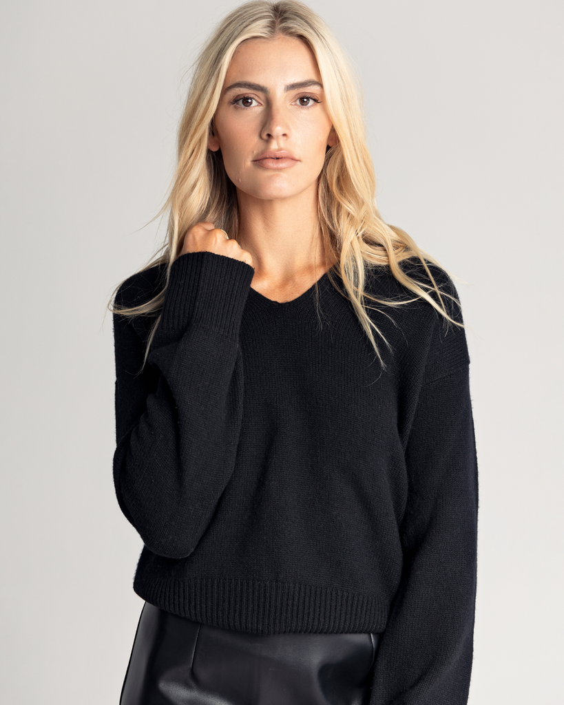 The Relaxed Collared Sweater is a luxurious testament to both warmth and style, expertly crafted from a sumptuous wool and cashmere blend. Designed for a relaxed fit, its oversized silhouette drapes effortlessly, embracing comfort without compromising on chic sophistication. By Romy, now available at After Eight. 