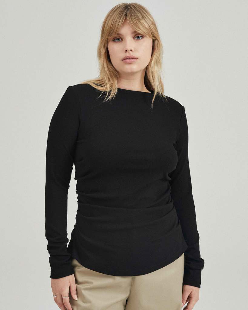 Inspired by 90s minimalism, the Longsleeve Harlow Top is streamlined in shape, the high boat neckline creates a sense of elegance, complete with gentle ruching along the seams of the body and sleeves. Truly celebrating local craftsmanship, the Harlow story was proudly designed, knitted and constructed entirely in Melbourne, Australia. By Friends With Frank, now available at After Eight.
