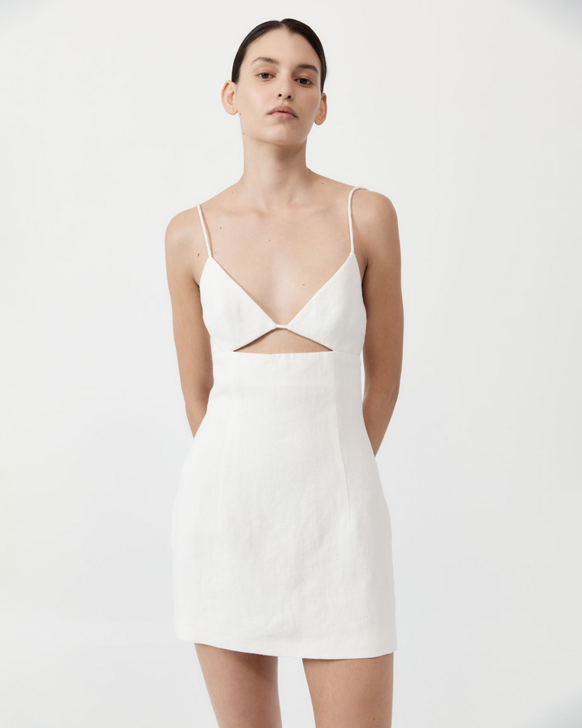 Inspired by the idea of underwear as outerwear, the Linen Bra Mini Dress takes cues from classic lingerie silhouettes. Boasting a bra bodice, thin straps, centrefront cut out, centreback bra fastening and mini length, the Linen Bra Mini Dress has been crafted for a fitted silhouette. Made from a weighted 100% linen with a silky-soft tencel lining, the Linen Bra Mini Dress combines elements of classic tailoring with the sensual feminity of unexpected cut-outs. By St Agni, now available at After Eight. 