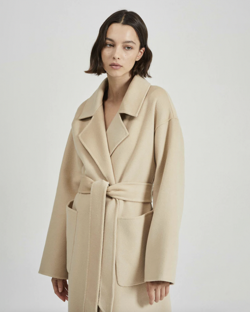 The Camilla Coat is a luxurious investment piece, designed to be worn throughout a lifetime. Crafted by hand from an ultra soft wool-cashmere blend, the Camilla is expertly tailored in an oversized silhouette, that can be cinched in at the waist by a detachable belt. Expert craftsmanship, luxuriously soft cashmere, and relaxed tailoring makes this coat an effortless staple you will come back to season after season. By Friends With Frank, now available at After Eight.