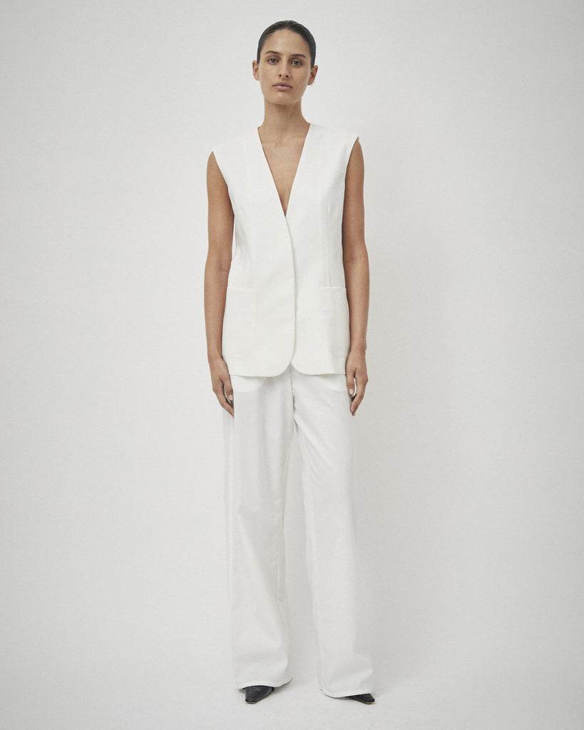 Crafted from a lightweight Japanese drill, the elastic wide leg pant in ivory feature an elastic waist band and pockets. By Beare Park, now available at After Eight. 