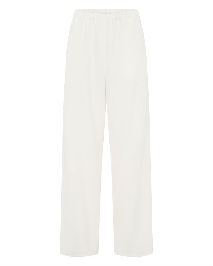 Crafted from a lightweight Japanese drill, the elastic wide leg pant in ivory feature an elastic waist band and pockets. By Beare Park, now available at After Eight. 