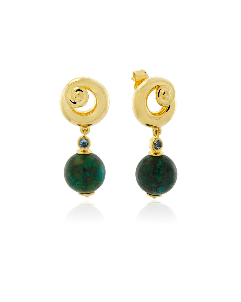 The Siren Earring feature a swirl detail made from solid sterling silver with 18kt gold vermeil, with blue topaz and reclaimed chrysocolla spheres. By sustainable Australian brand Mineraleir.